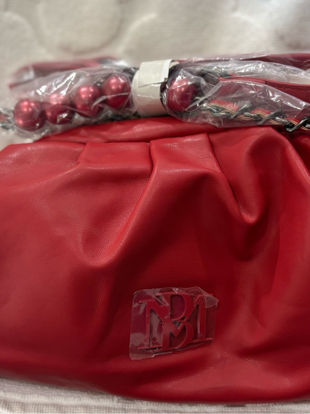 Badgley Mischka Red Dumpling Shoulder Bag with Beaded Chain Detail